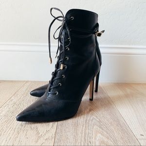 High heeled Black Leather Boots